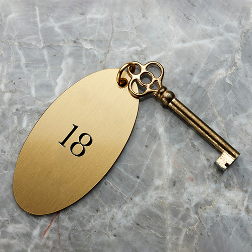 Porte clé en laiton avec un numéro de chambre